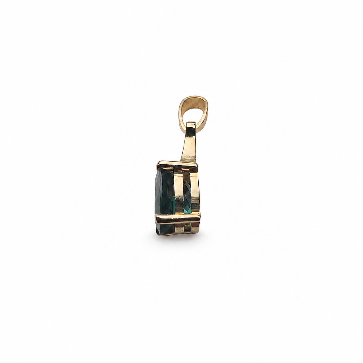 Custom lagoon tourmaline pendant and stud earrings set in 14K yellow gold, featuring 3.34 total carats of oval blue-green tourmalines.