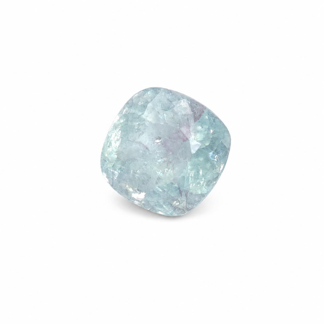 Certified loose 4.43 carat Paraíba tourmaline with ice-blue colour, a faceted freeform cushion shape and natural internal inclusions.
