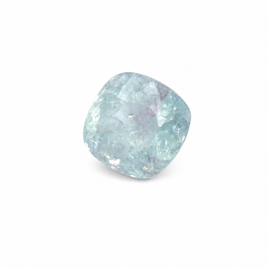 Certified loose 4.43 carat Paraíba tourmaline with ice-blue colour, a faceted freeform cushion shape and natural internal inclusions.